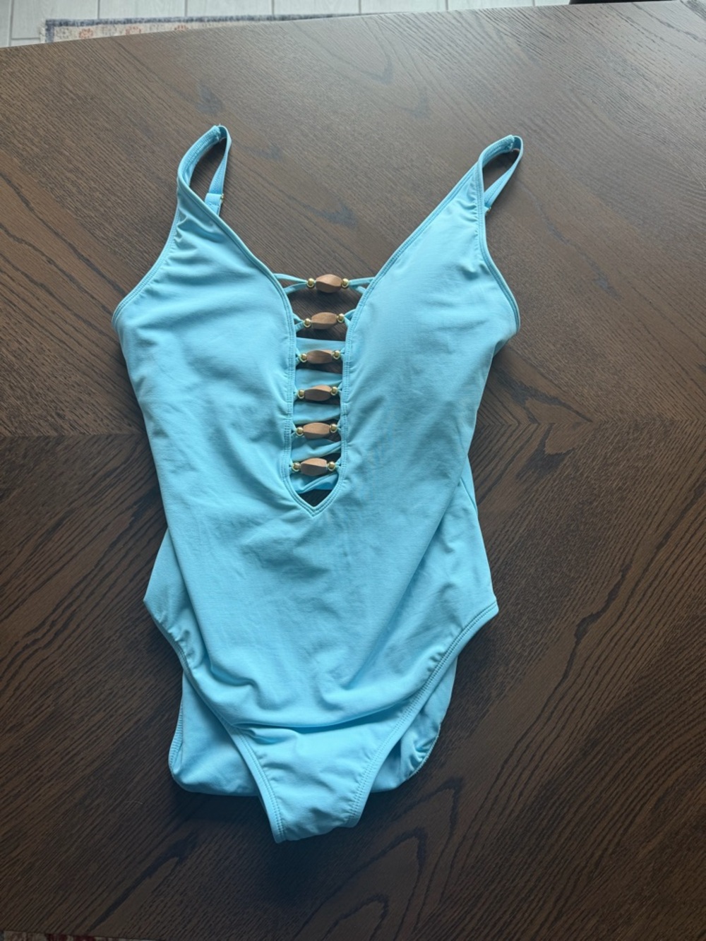 NWOT Bleu Rod Beattie Light Blue One-Piece Swimsuit with wood/bead accent
